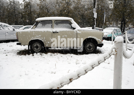 Trabant car partly covered with snow after heavy snowfall in Warsaw, Poland Stock Photo