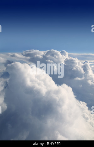 Blue sky view from aircraft airplane and white clouds, texture Stock Photo