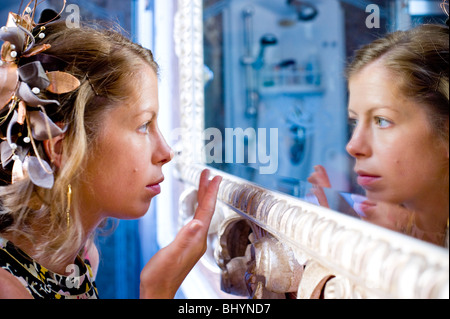 Bride putting make-up on Stock Photo