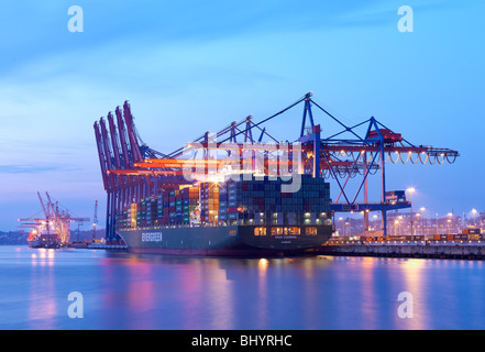 A containership in the harbor of Hamburg, Germany on January 2, 2010. Stock Photo