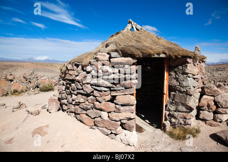 Round stone hut in Peru, South America Stock Photo