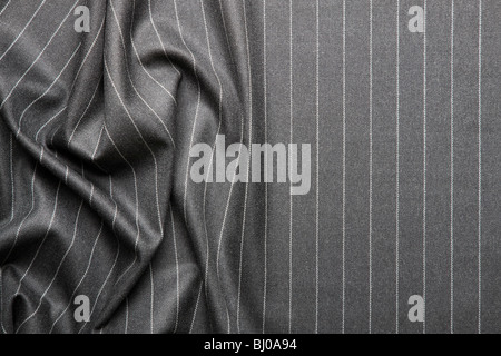 High quality pin stripe suit background texture with folds and copy space Stock Photo