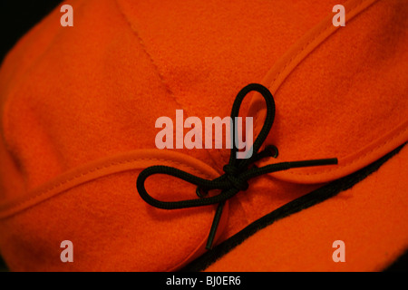 close up still life stormy kromer orange blaze hat Stock Photo