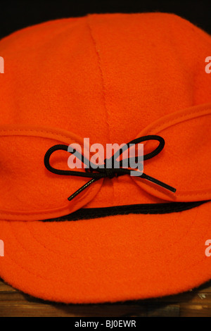 close up still life stormy kromer orange blaze hat Stock Photo