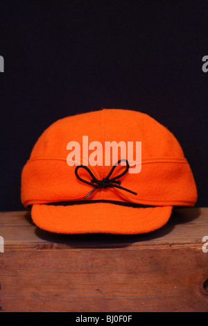 close up still life stormy kromer orange blaze hat Stock Photo