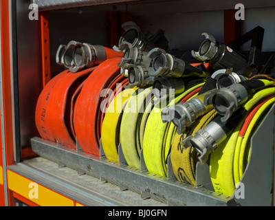 Fire hoses coiled in a fire engine in France Stock Photo