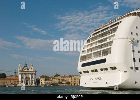 Venice Italy, mass tourism big ships tourists cruise ship sails down the Canale della Giudecca. HOMER SYKES Stock Photo