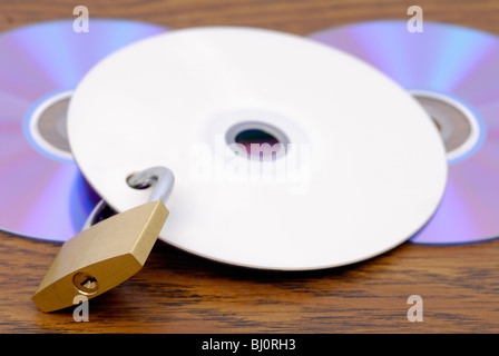 DVD with padlock security Stock Photo