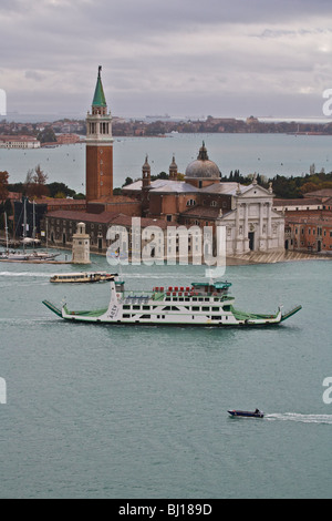 A passenger and car ferry making its way along the Grand Canal in Venice, Veneto, Italy Stock Photo