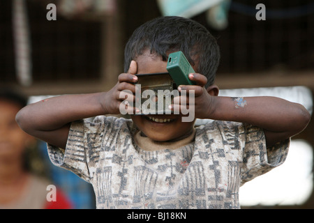 Portrait of a playing boy in a shelter for Internally Displaced People, Batticaloa, Sri Lanka Stock Photo