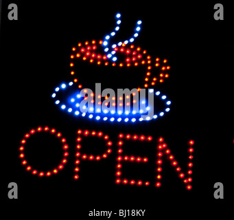 "Open" neon sign on coffee shop window, Budapest, Hungary Stock Photo