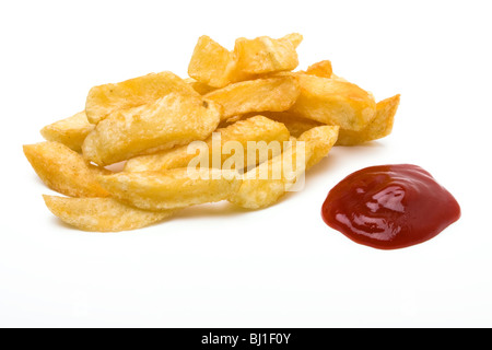 English Chip shop chips isolated against white background with portin of tomato ketchup. Stock Photo