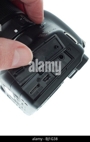 |Canon EOS 550D - Interface ports for microphone, remote control, USB and HDMI with rubber cover. Stock Photo