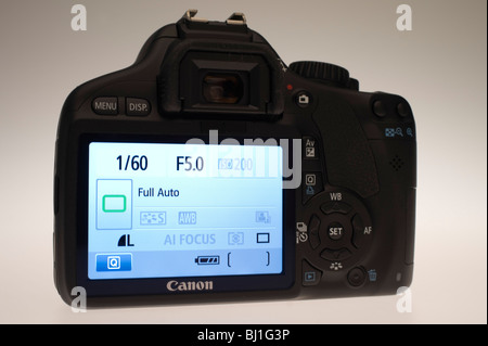 Canon EOS 550D or Digital Rebel 2Ti digital SLR camera with movie function March 2010. Rear 3 inch LCD showing user interface. Stock Photo