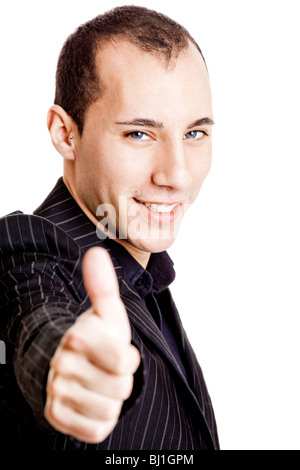 Portrait of a young businessman showing thumbs up, isolated on white background Stock Photo