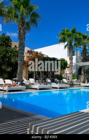 Hotel pool in Kamari, Santorini Island, Greece. EDITORIAL USE ONLY! Stock Photo