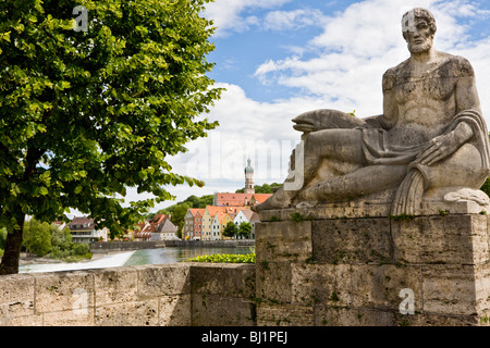 Sculpture with river and townscape, Landsberg am Lech, Bavaria, Germany Stock Photo