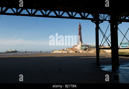 Blackpool Tower, the piers and the Pleasure Beach are the landmarks of Blackpool's Golden Mile, Lancashire, United Kingdom Stock Photo