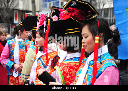 Paris, France, 'Chinese New Year' Parade in street, chinese female teens  in traditional costumes Stock Photo