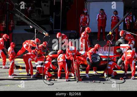 Fernando Alonso of the 2010 Ferrari team doing a pit stop at the circuit in Montmelo, Barcelona, Spain Stock Photo