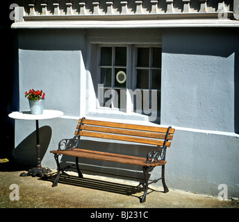 An empty garden bench, Alesund, Norway Stock Photo
