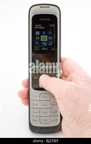 Studio Close up Woman's hand using a mobile phone to text message Stock Photo