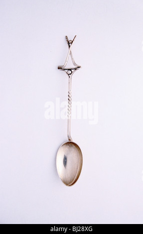 Silver spoon with two crossed clubs and ball, British, 1922. Artist: Unknown Stock Photo