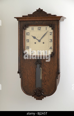 1920's wall clock, Scandinavian, oak case Stock Photo