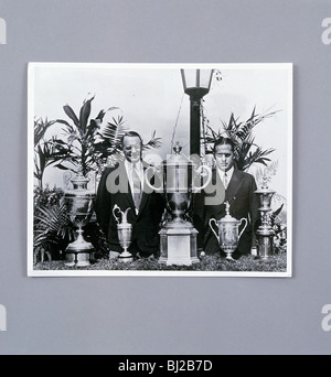 Bobby Jones with Grand Slam trophies, c1930. Artist: Unknown Stock Photo