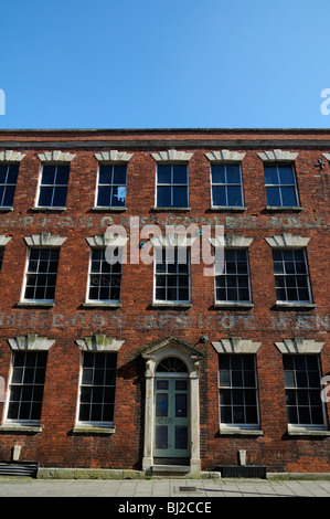 An old industrial building in a deprived area of inner city Bristol in a run down state, awaiting redevelopment or conversion Stock Photo