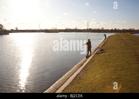 Fly fishermen at Walthamstow reservoirs London England. Stock Photo