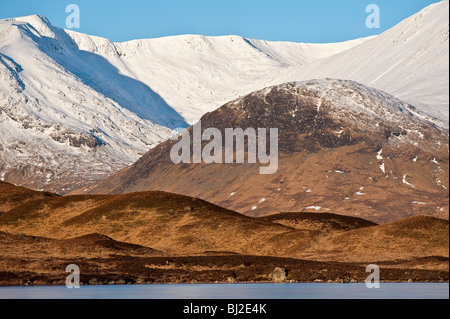 Looking over Lochan na h-Achlaise towards the snow covered flanks of Clach Leathad (Rannoch Moor).