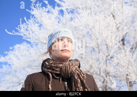 Portrait of a woman on a frosty winter day.  Sturgeon Creek, Winnipeg, Manitoba, Canada. Stock Photo