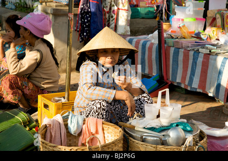 An old lady in the market of Luang Prabang Laos Stock Photo