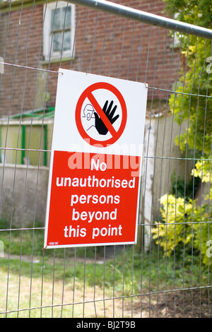 Sign for no unauthorized access Stock Photo - Alamy