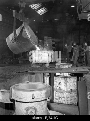 Teeming iron at Wombwell foundry, South Yorkshire, 1963. Artist: Michael Walters Stock Photo