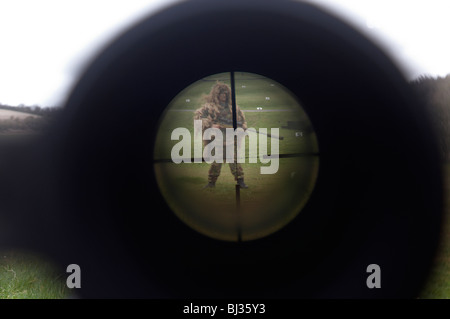 Looking down the telescopic sight of the new British-made Long Range L115A3 sniper rifle. Stock Photo
