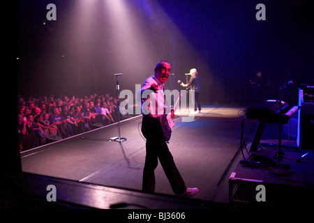 On stage during their show, Francis Rossi (foreground) and Rick Parfitt of the band Status Quo play from 90-minute repertoire. Stock Photo