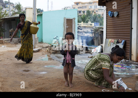 Rangoli festival designs in an Indian street made at the Hindu festival of Sankranthi or Pongal. Stock Photo