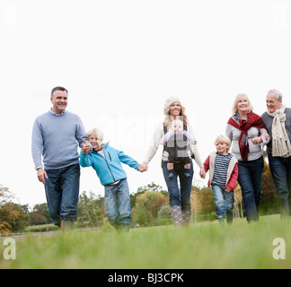 3 generations walking in nature Stock Photo