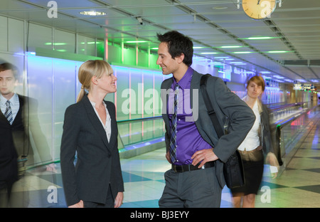 business couple at airport, talking Stock Photo