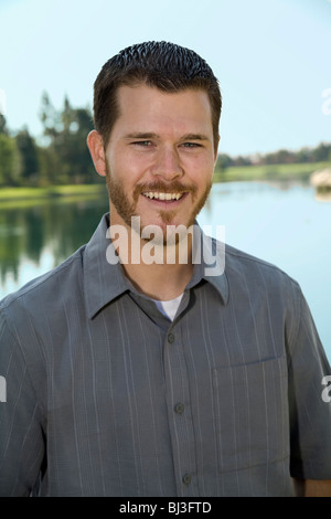 Portrait of 20 to 30 year years old caucasian young man in park. MR  © Myrleen Pearson Stock Photo