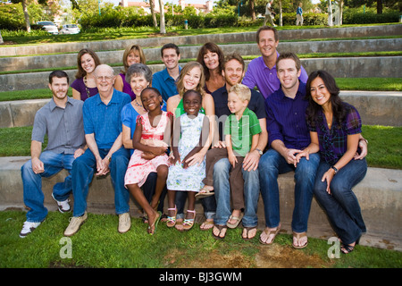 4 generation family portrait includes two girls 4 & 6 adopted from West Africa. Looking at camera MR  © Myrleen Pearson Stock Photo