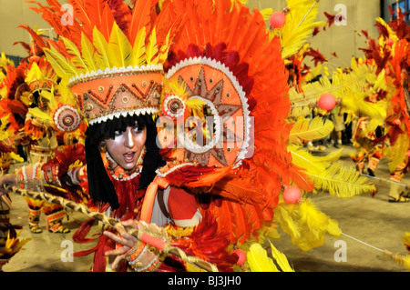 Imperatriz Leopoldinense samba school, young woman dressed as a Native American with spear, Carnaval 2010, Sambodromo, Rio de J Stock Photo