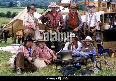 American Wild West Historical re-enactment United States history cowboy cowboys 19th century USA camp rifle rifles gunslinger Stock Photo