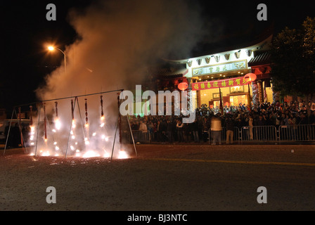 Firecrackers at night during the Chinese New Years Celebration. Stock Photo