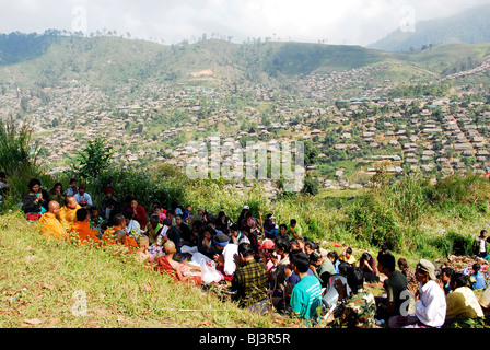mourners at a funeral, umpium refugee camp(thai burmese border) , south of mae sot , tak,thailand Stock Photo