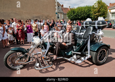 Best man arriving at wedding ceremony on moto-trike - Indre-et-Loire, France. Stock Photo