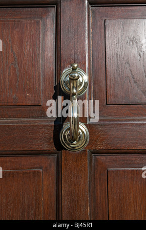 door knocker on wooden door Stock Photo