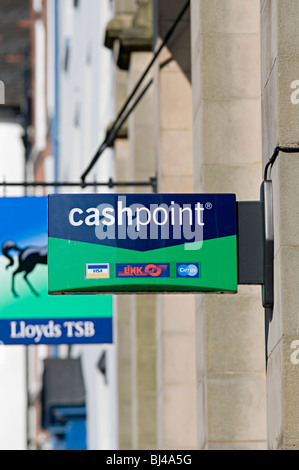 cashpoint sign of a lloyds bank in ludlow with visa cirrus and link atm Stock Photo